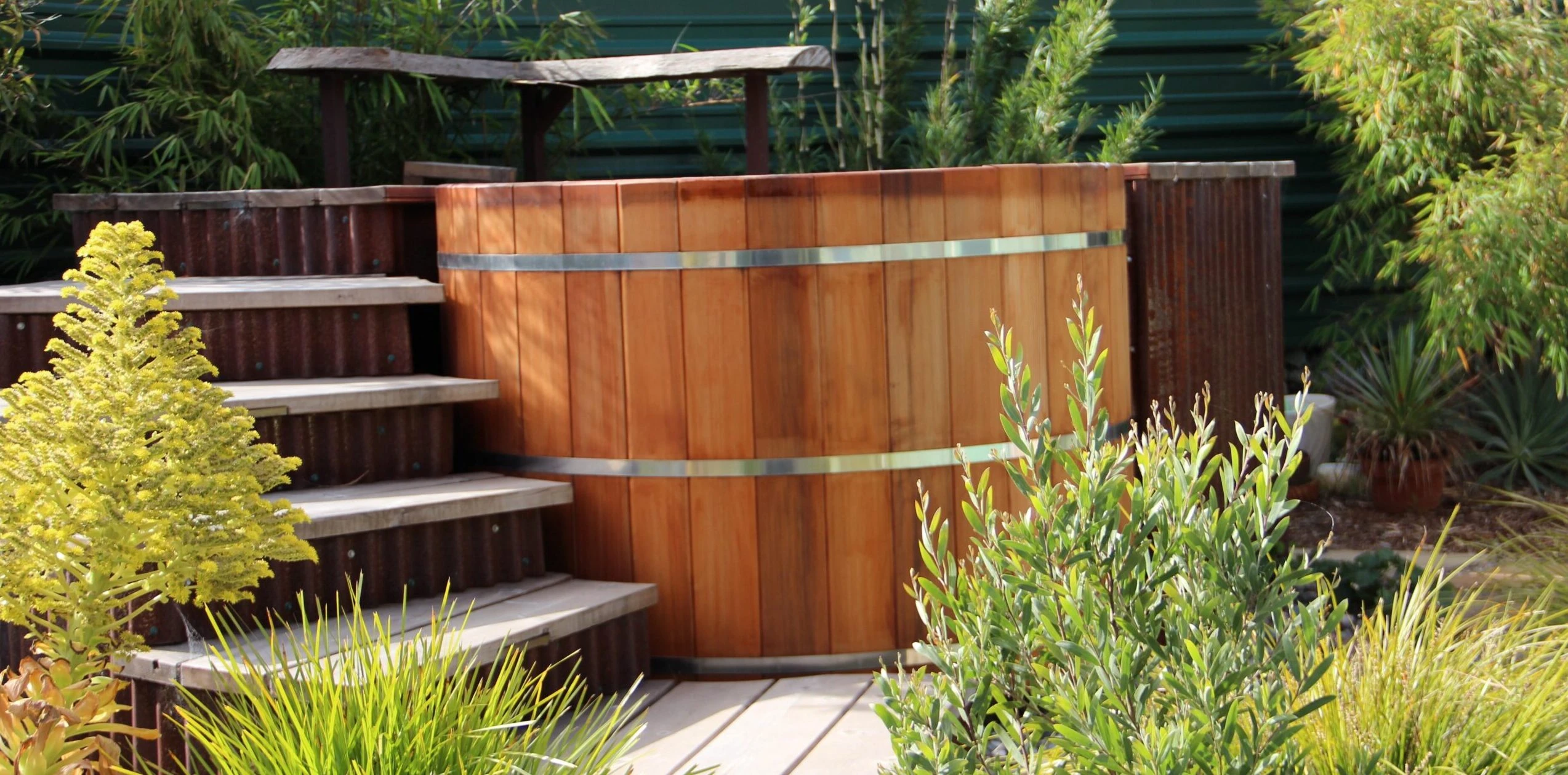 Installed Cedar Hot Tub with half deck surround